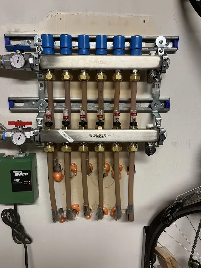 Plumber performing Water Heater Repair at a residential property in Plainsboro